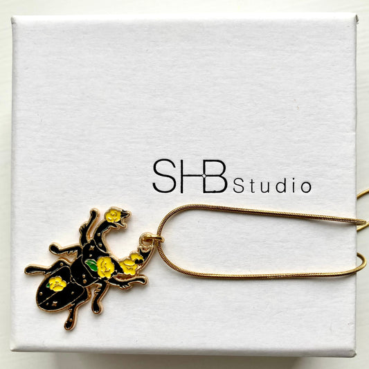 Floral Beetle Necklace – Gold Enamel Insect Pendant