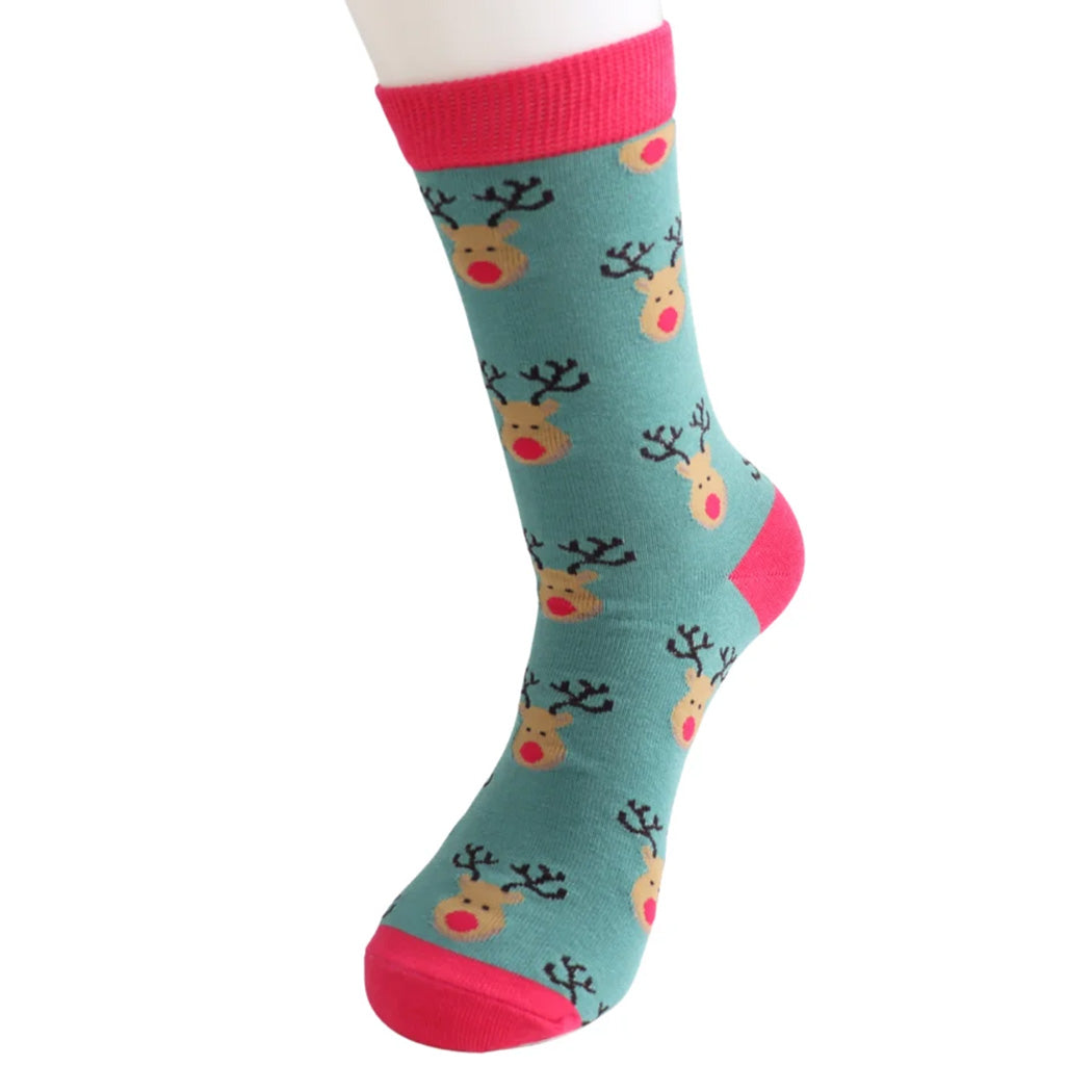 Teal sock with reindeer pattern and pink accents on a white background