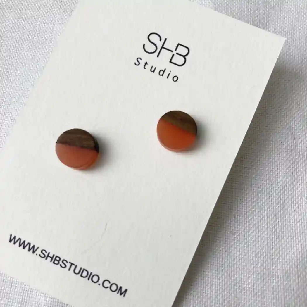 circle earrings on a SHB Studio branded card.
