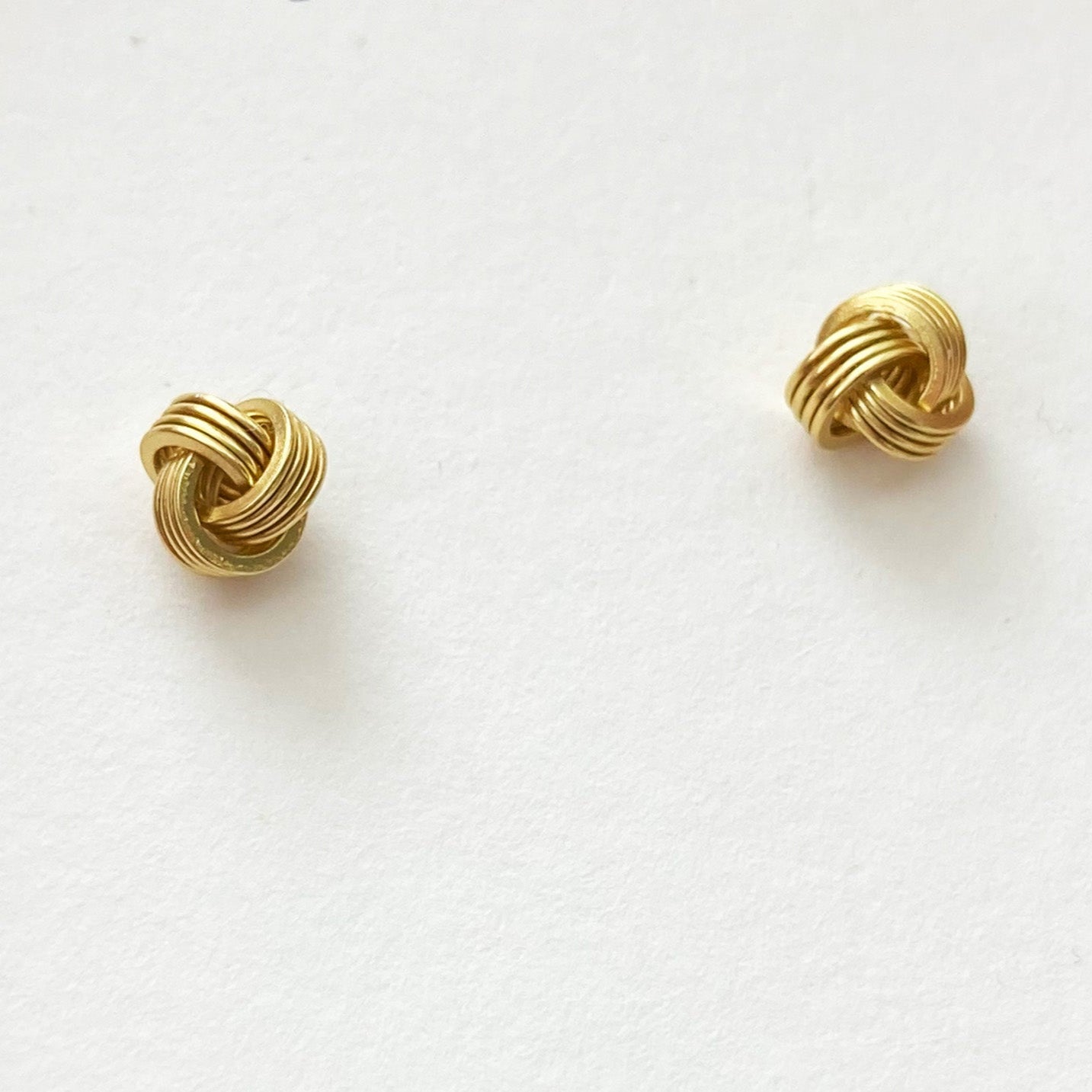 elegant knot silver studs gold plated