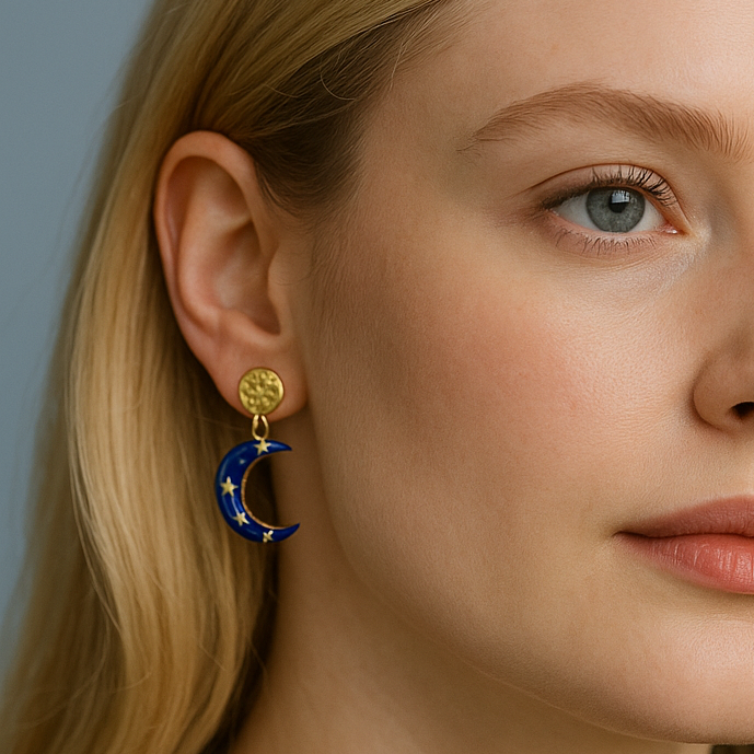 Close-up of a woman wearing earrings with a gray background