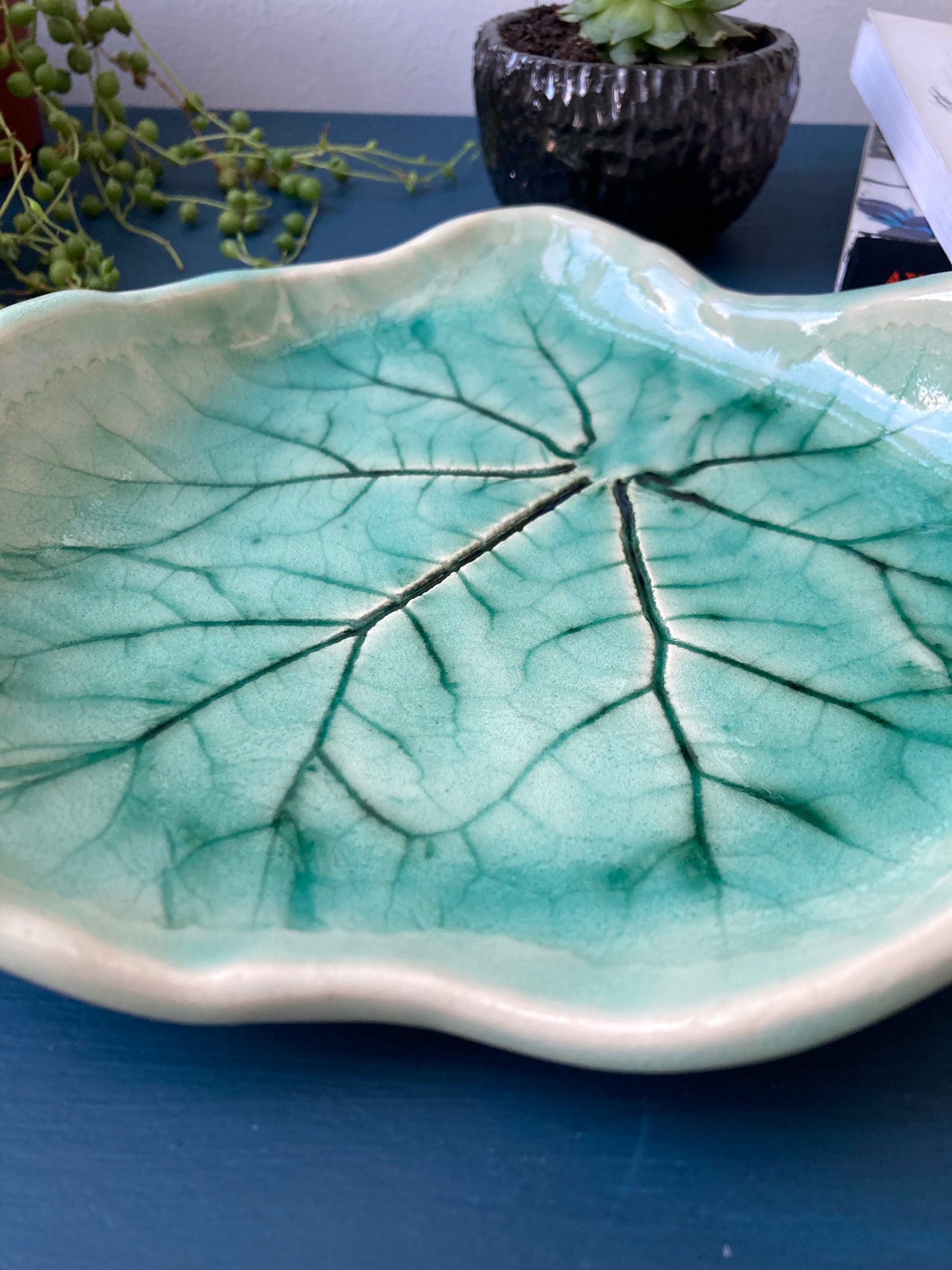 Handmade green leaf pottery dish