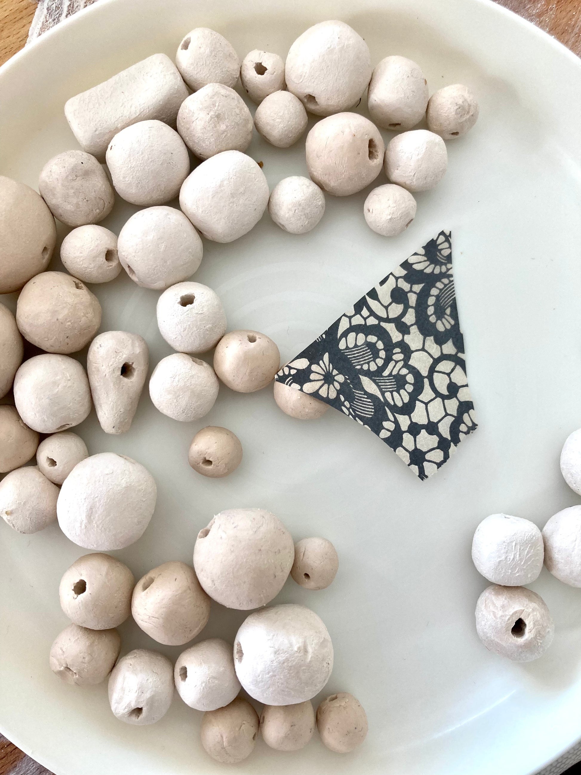 aw ceramic beads and patterned fragment