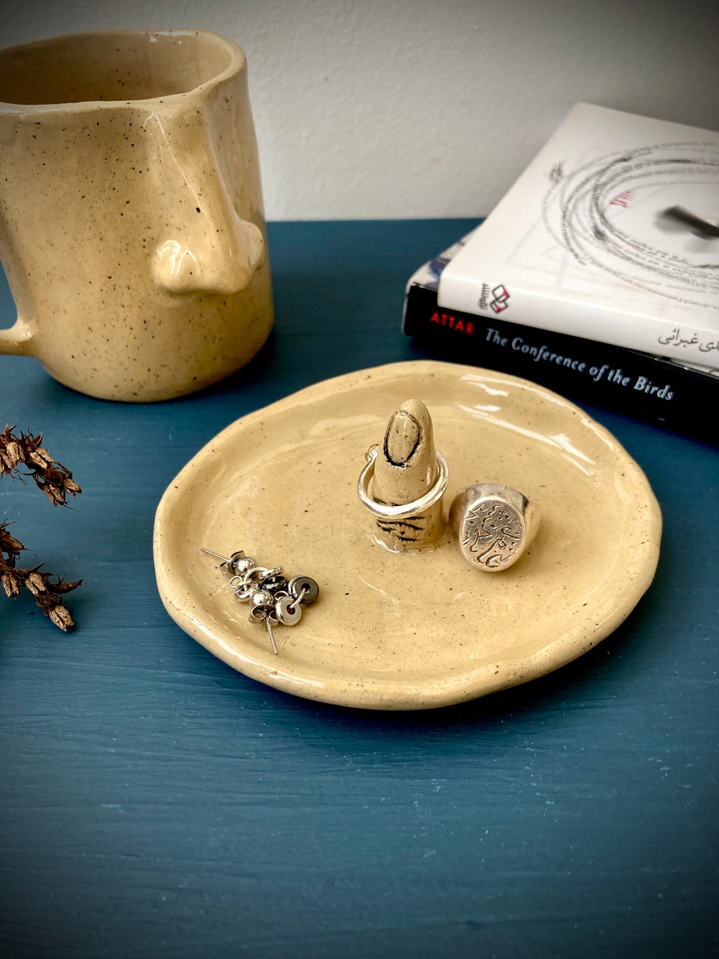Beige ceramic ring holder dish