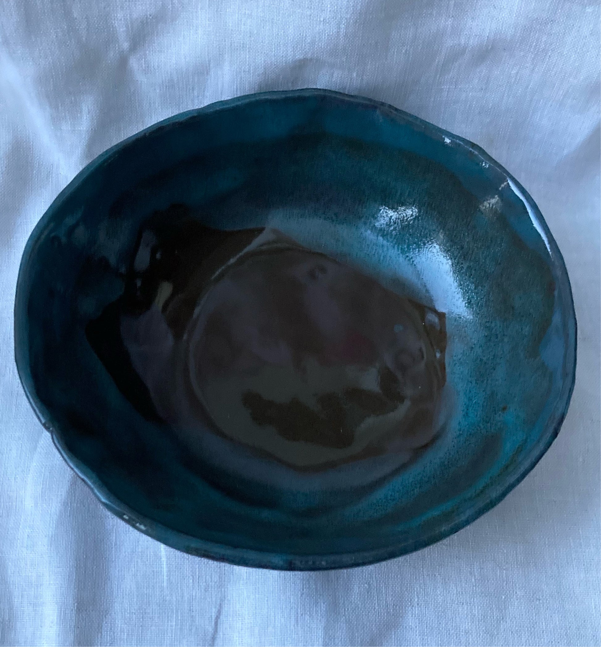 Glossy handmade ceramic bowl