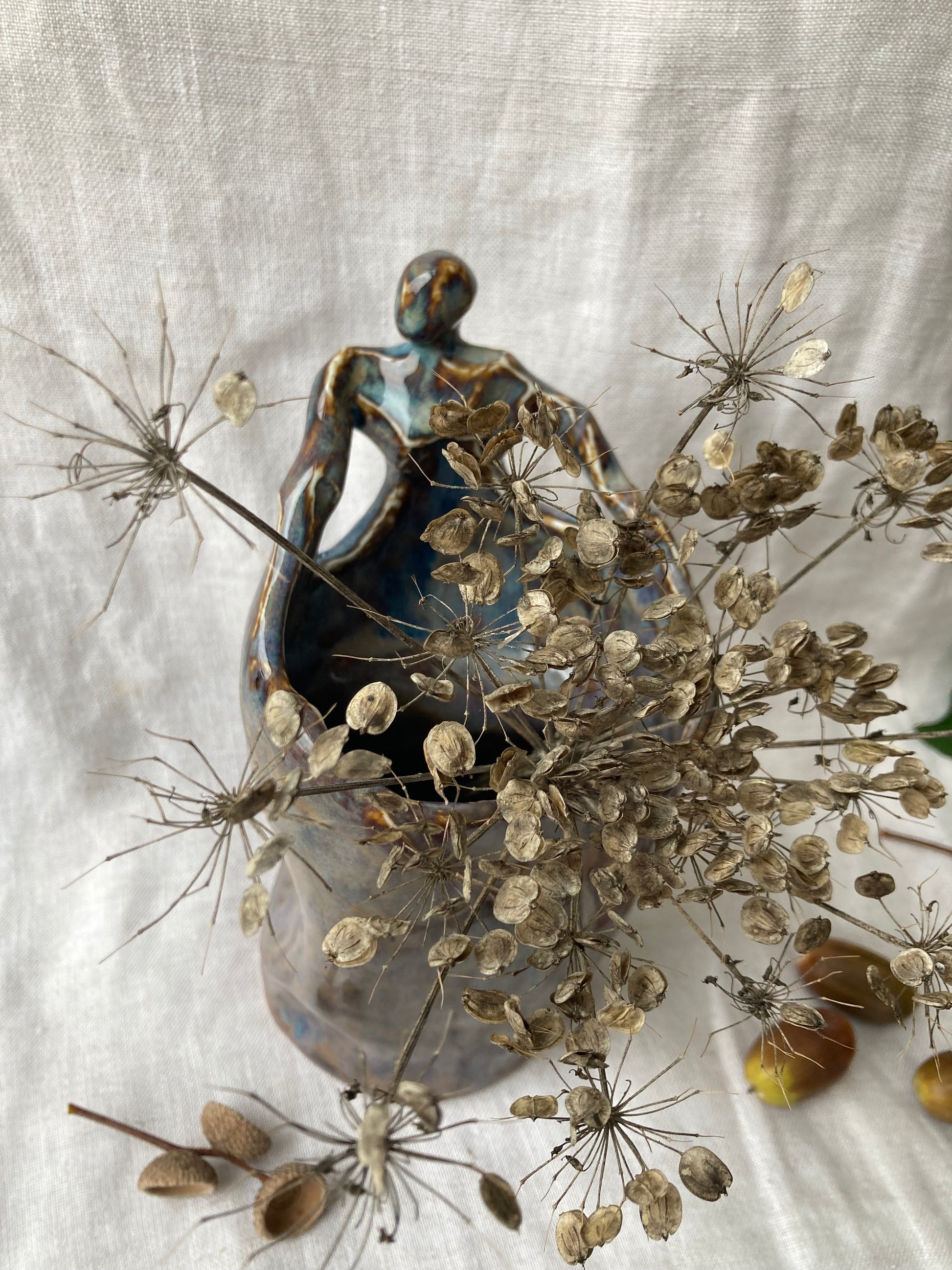 Art pottery human sculpture vase