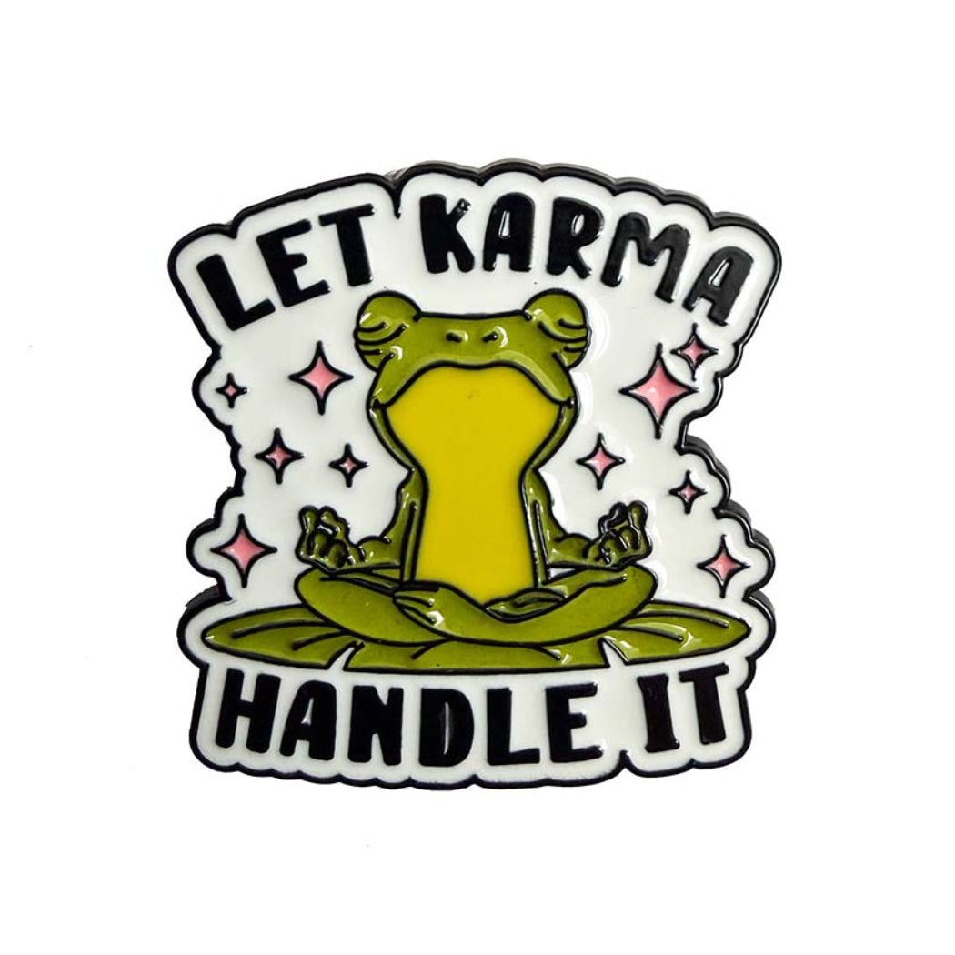green frog seating like meditation seating written black font let karma handle it pin badge 
