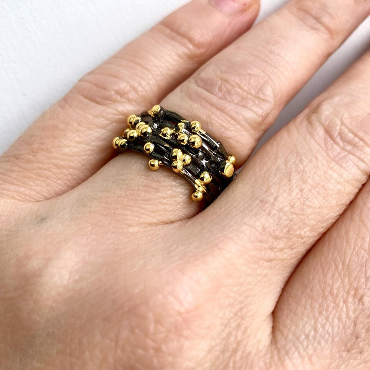 Gold and black small pearls ring 