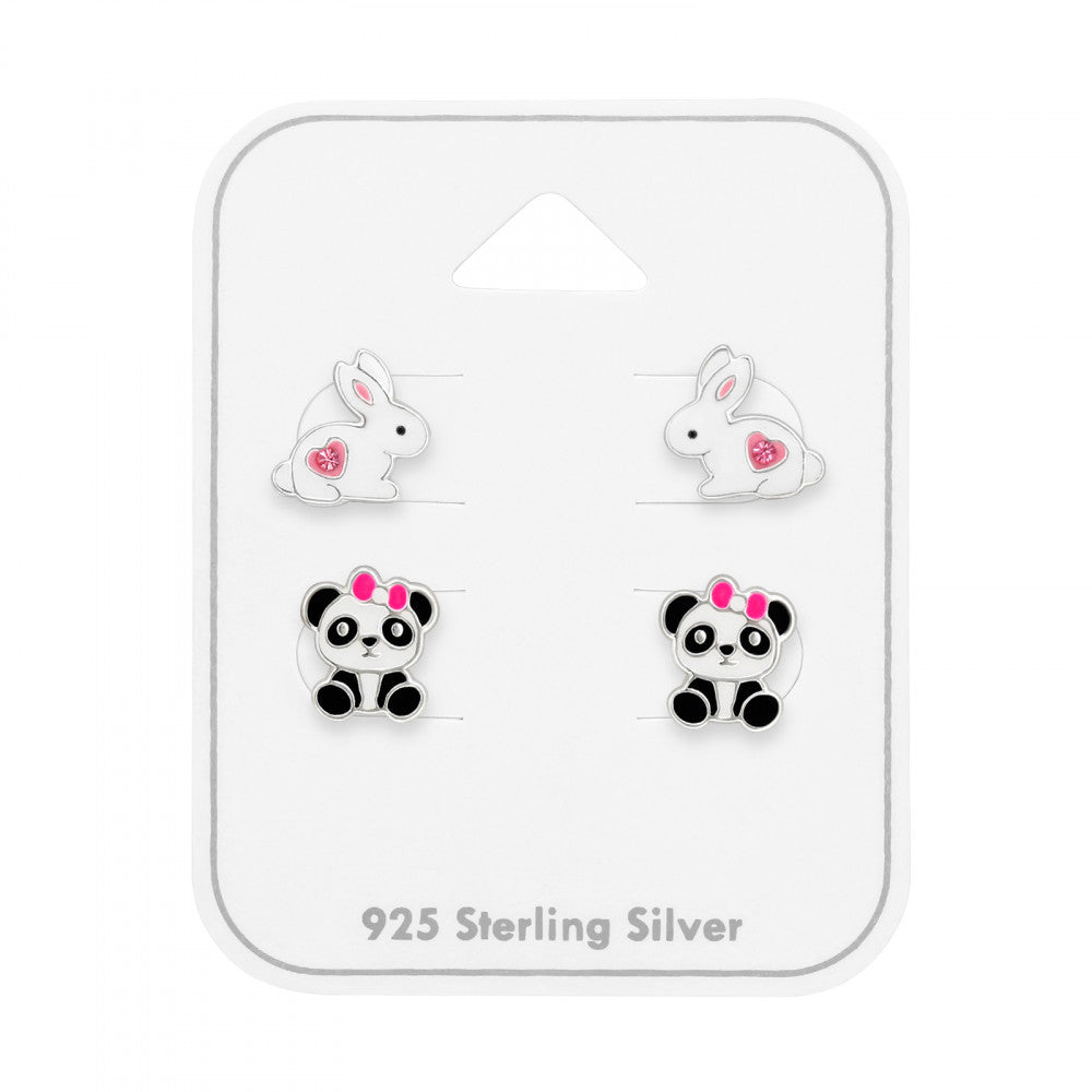 Two pairs of sterling silver stud earrings, a white rabbit and a panda, on a gift card
