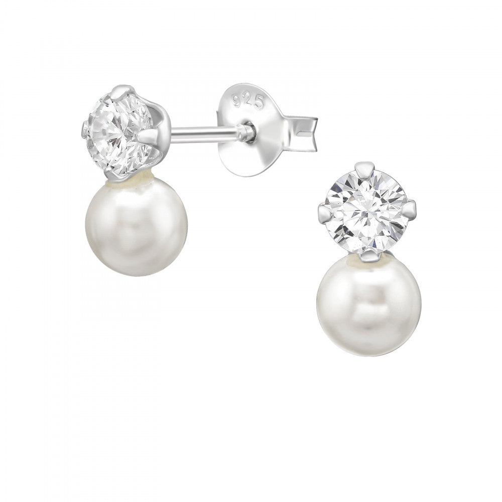Sterling silver stud earrings with a round cubic zirconia and a white faux pearl drop