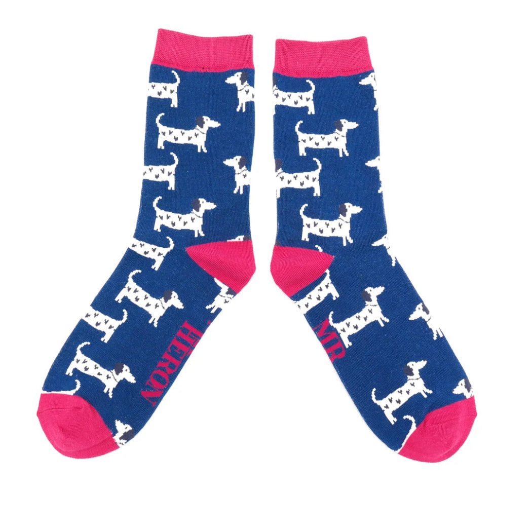 navy blue socks with white dogs and heart.