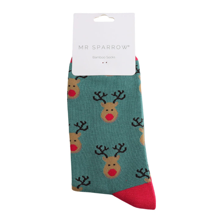 Teal sock with reindeer pattern and red accents, branded &