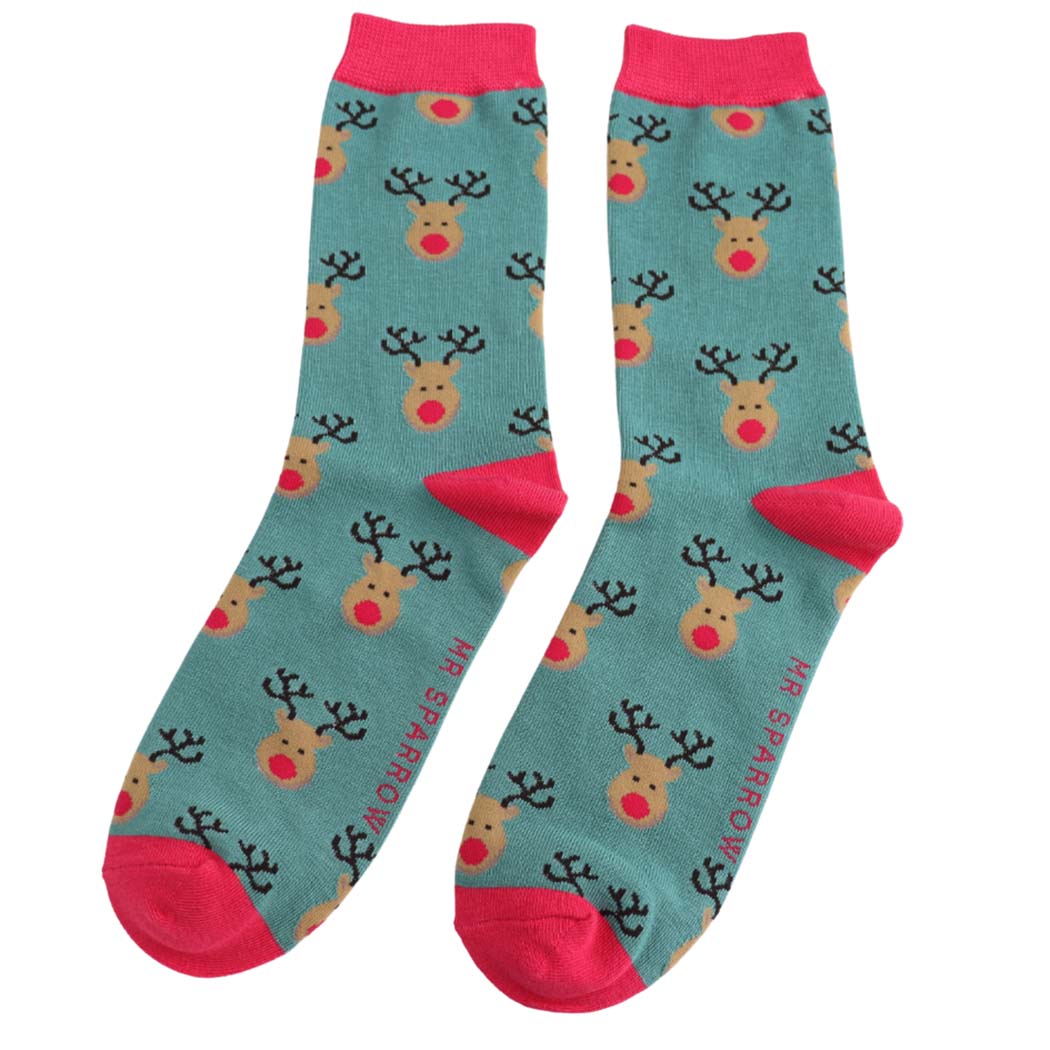 Teal socks with reindeer pattern and pink accents on a white background