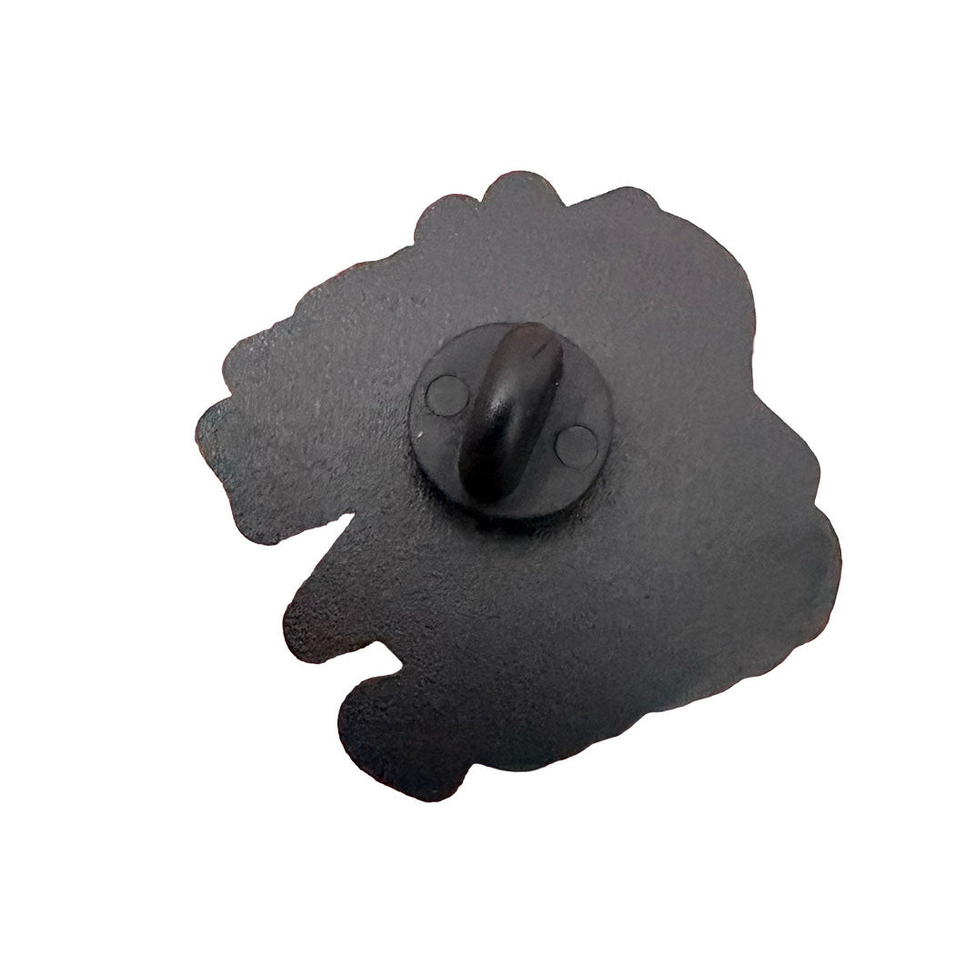 black back side of pin badge, set against a solid white background.