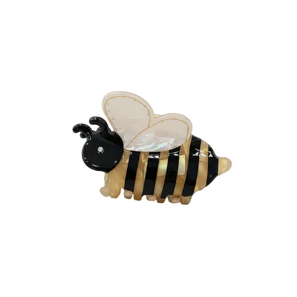 bee-shaped hair clip with black and yellow stripes on a white background.