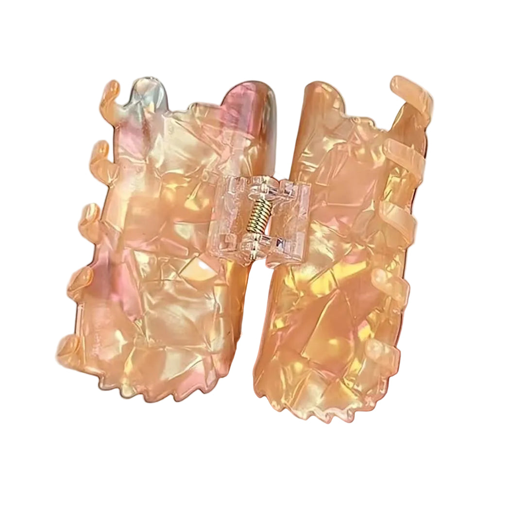 Back of hair claw opened on a light background
