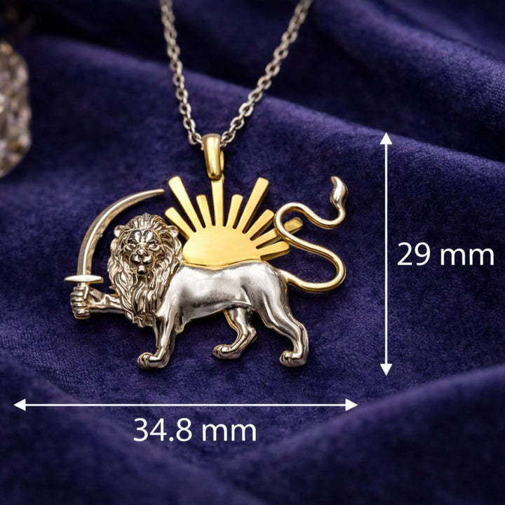 Lion pendant necklace with measurements on a dark fabric background