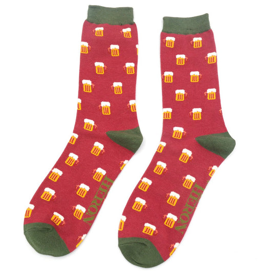 Red socks with beer mug pattern on a white background