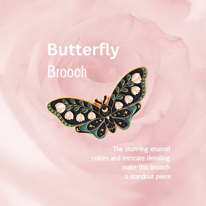 Butterfly brooch with intricate detailing on a pink background
