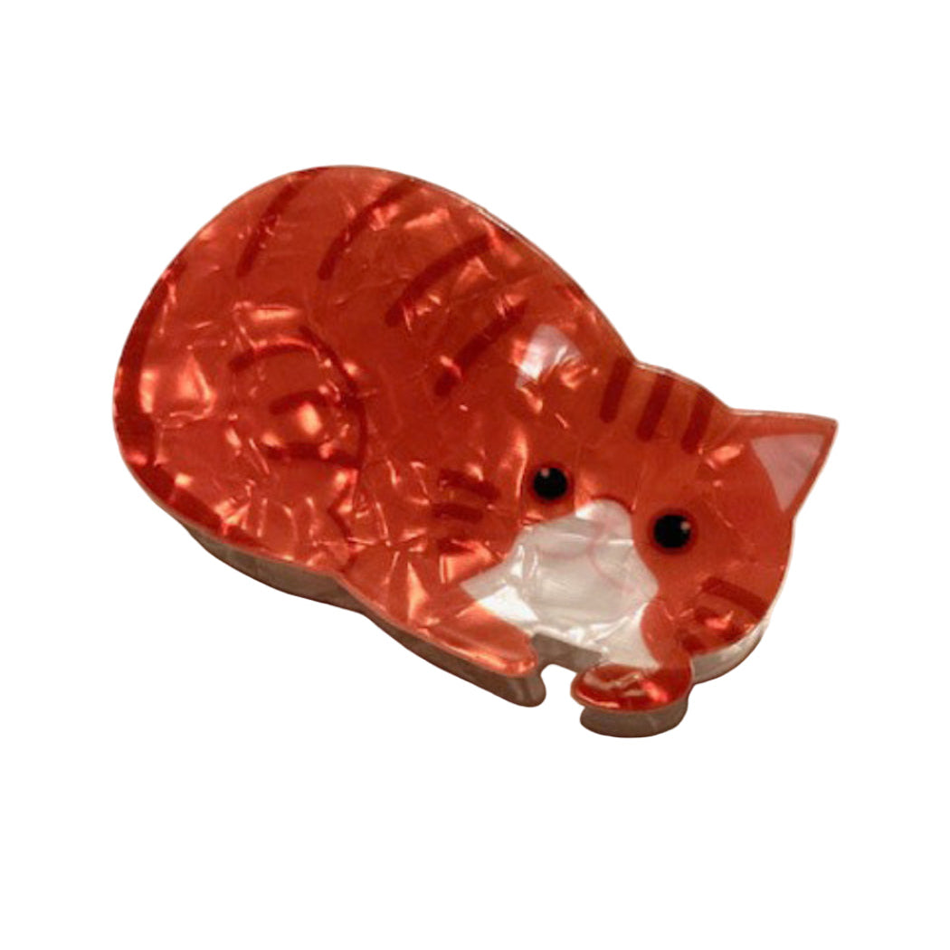 Orange-cat-shaped hair claw on a white background