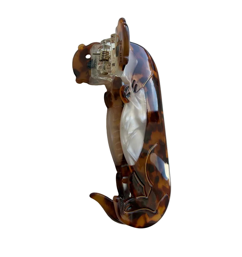 otter hair clip on a white background