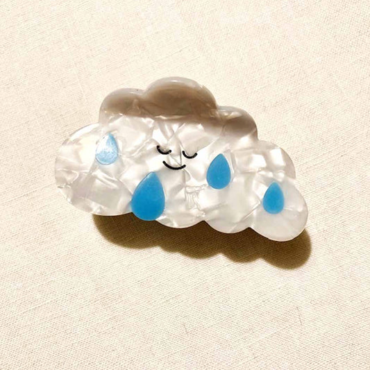 rain-cloud hair claw with smily face and drips of blue rain