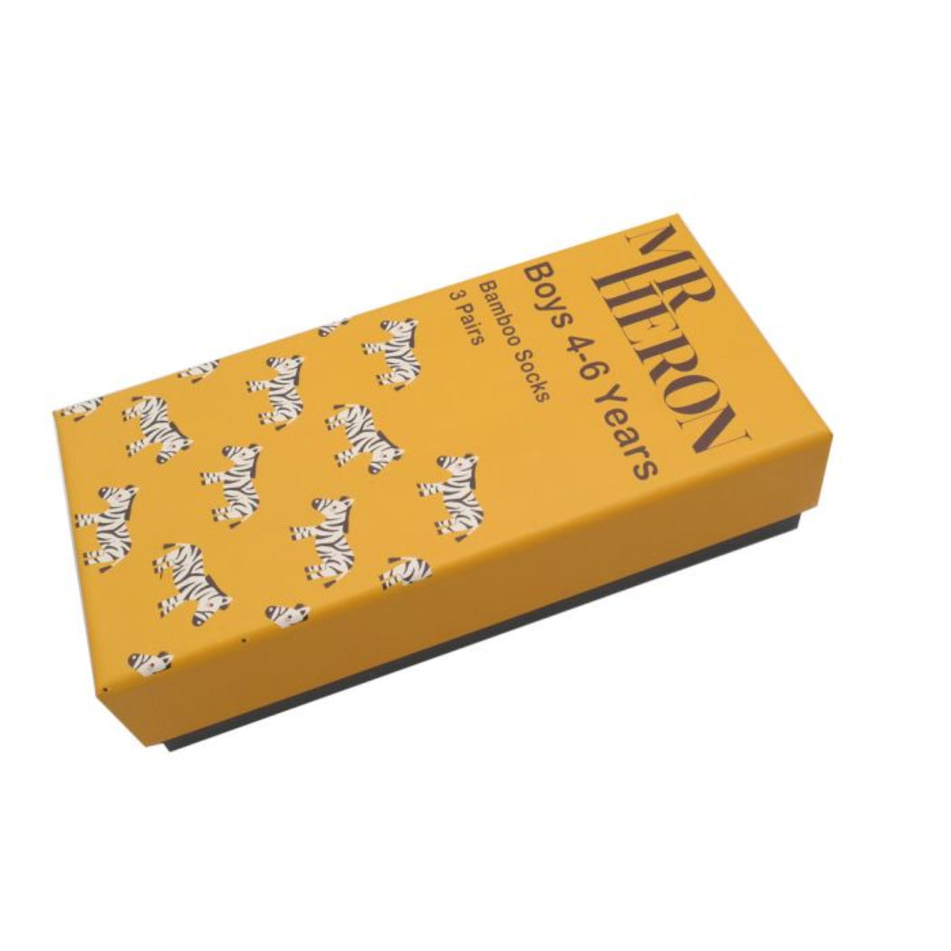 Yellow box with zebra pattern and 'HERON' branding on a white background