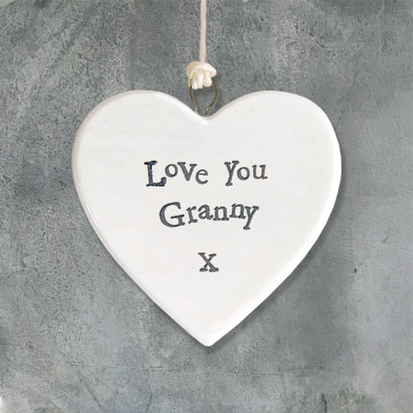 Heart-shaped ceramic plaque with 'Love You Granny X' text on a gray background