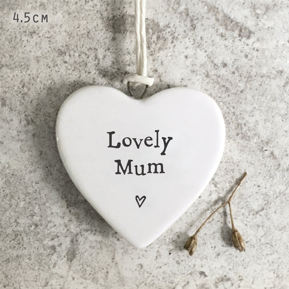 White porcelain heart hanging decoration with the words “Lovely Mum” printed in black text, minimalist sentimental gift for mum.4