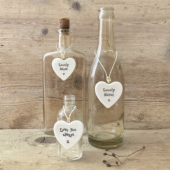 White porcelain heart hanging decoration with the words “Lovely Mum” printed in black text, minimalist sentimental gift for mum.3