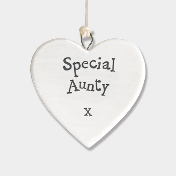 White porcelain heart hanging decoration with the words “Special Aunty” and a small heart, displayed on a neutral background.