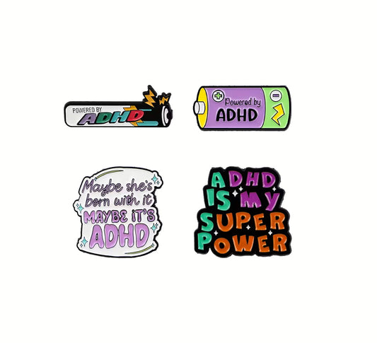 Four ADHD-themed pin badges on a white background