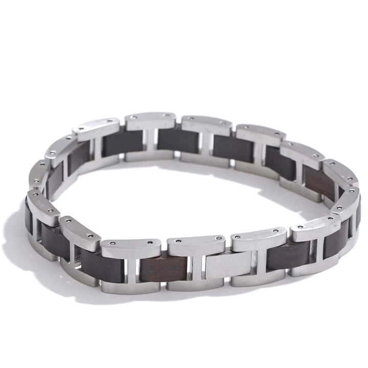 Silver and dark brown wood bracelet on a white background