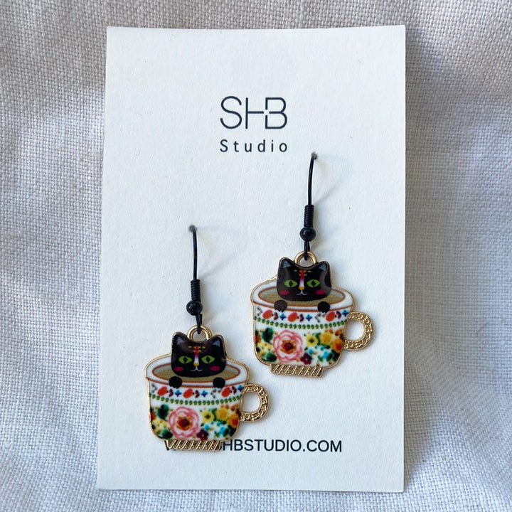Playful Cup Cat Earrings – Enamel Dangle Jewellery