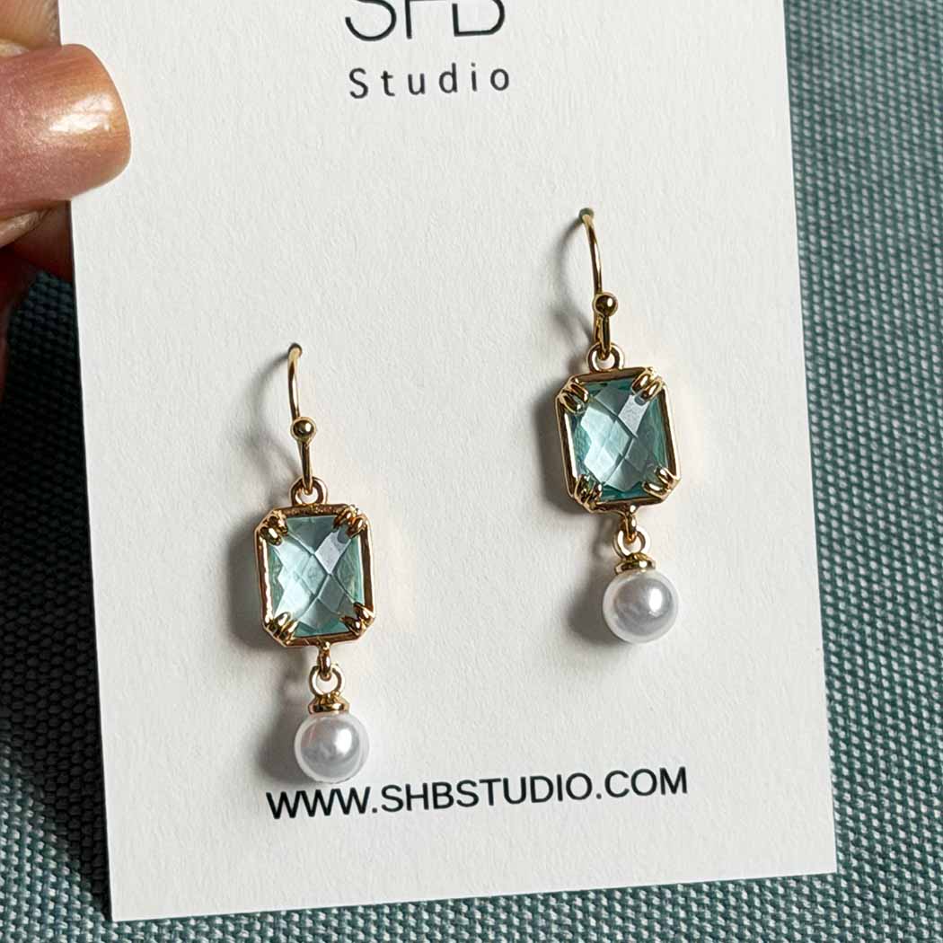 Elegant light blue and pearl drop earrings