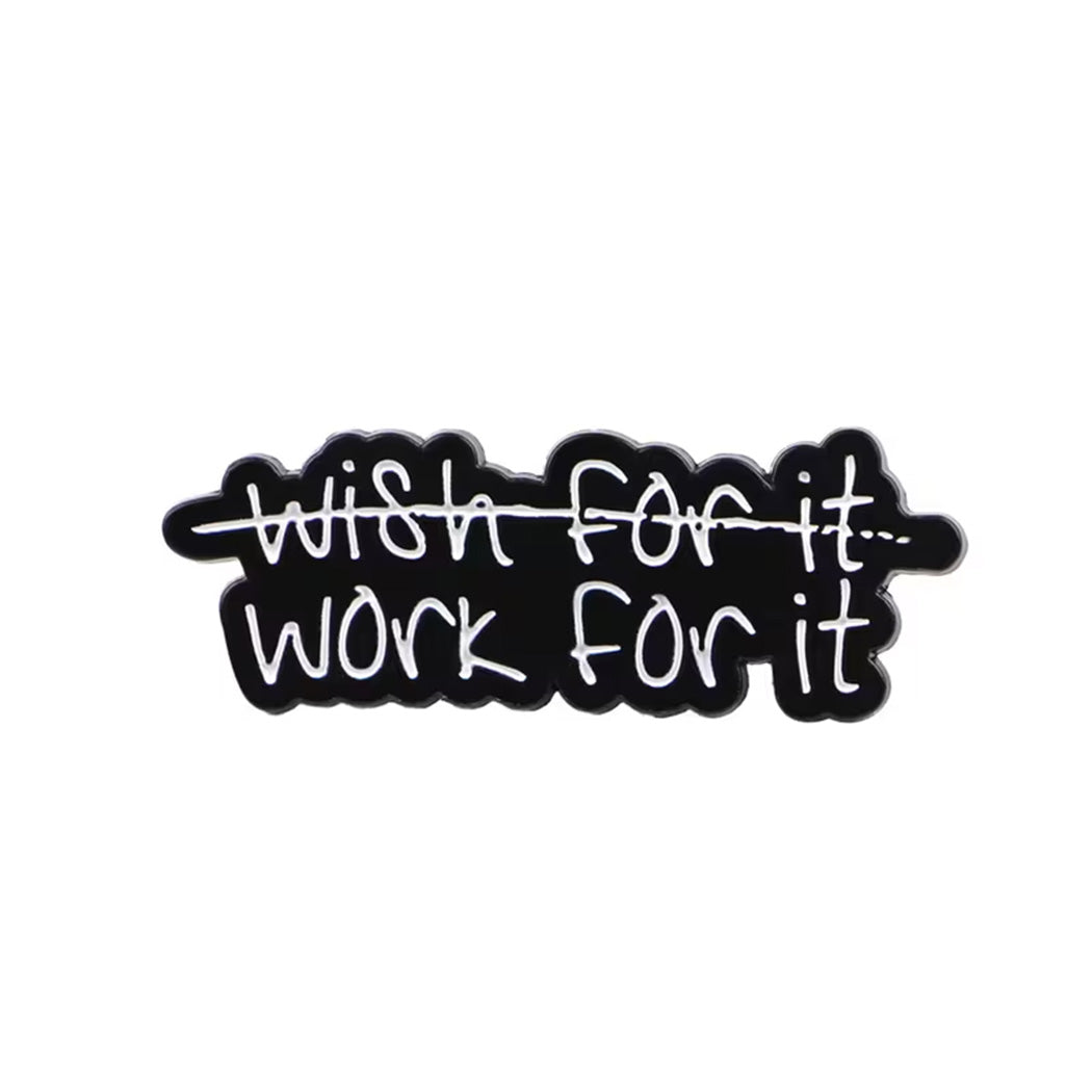 Black and white motivational pin badge with 'Wish for it, Work for it' text on a white background