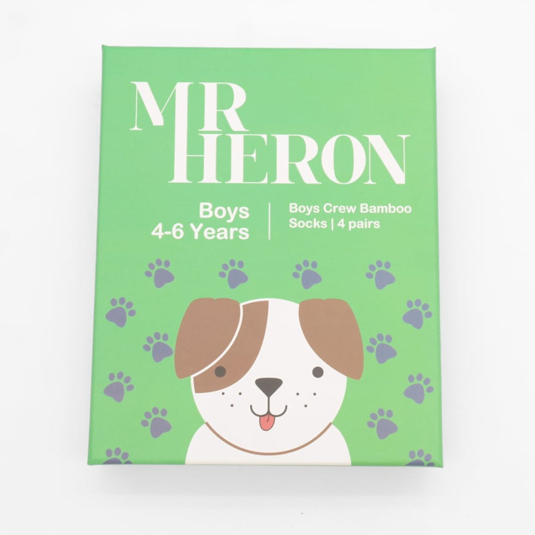 Green packaging for boys' bamboo socks with a dog illustration and 'MR HERON' branding.