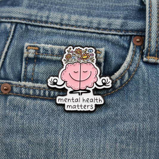 Cartoon brain with flowers and 'mental health matters' text on a white background