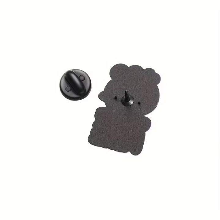 Black side of bee  pins on a white background