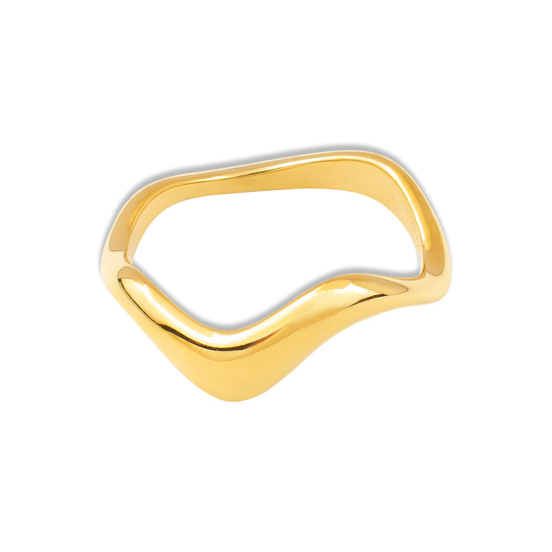 Gold ring with a modern, wavy design on a white background