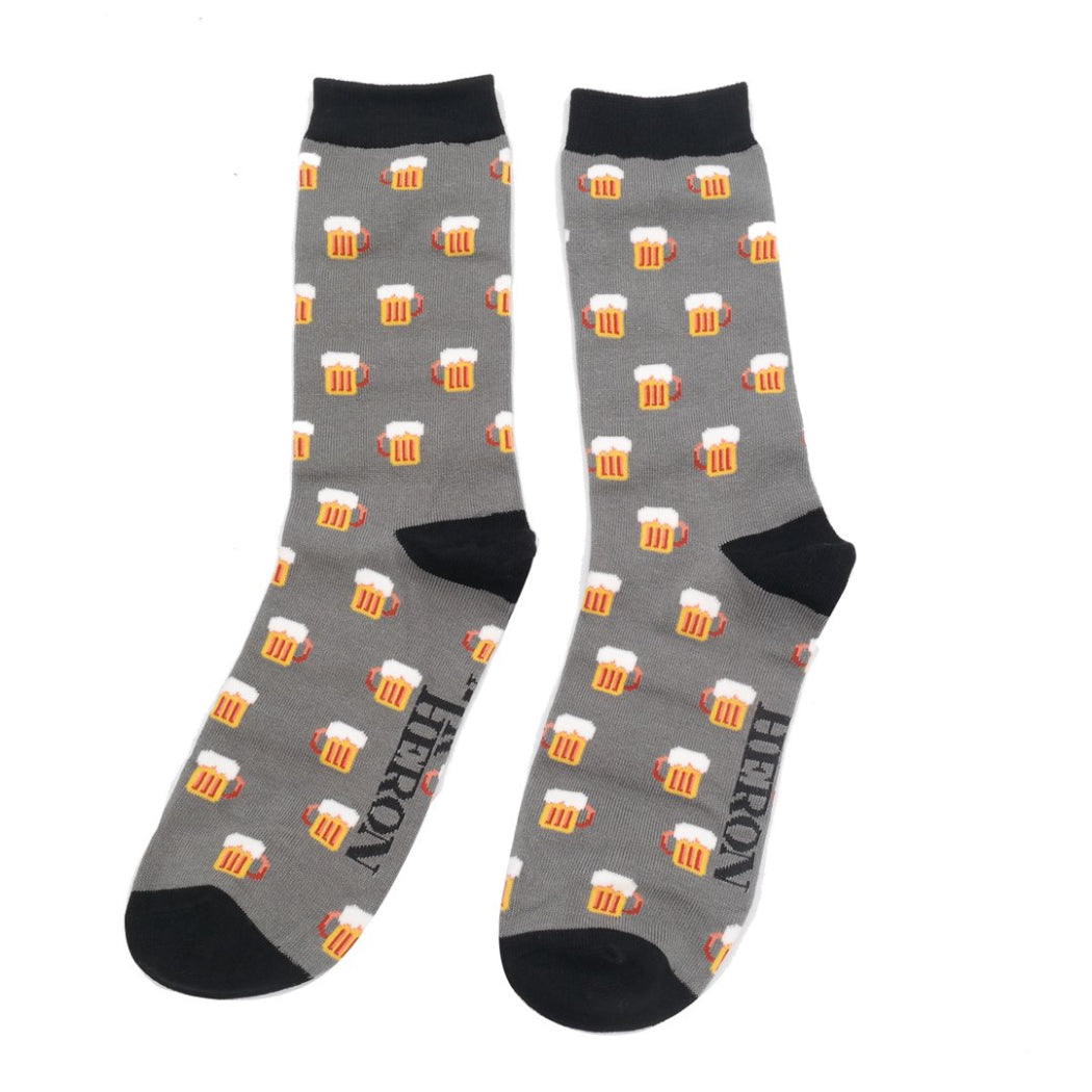 Gray socks with beer mug pattern on a white background