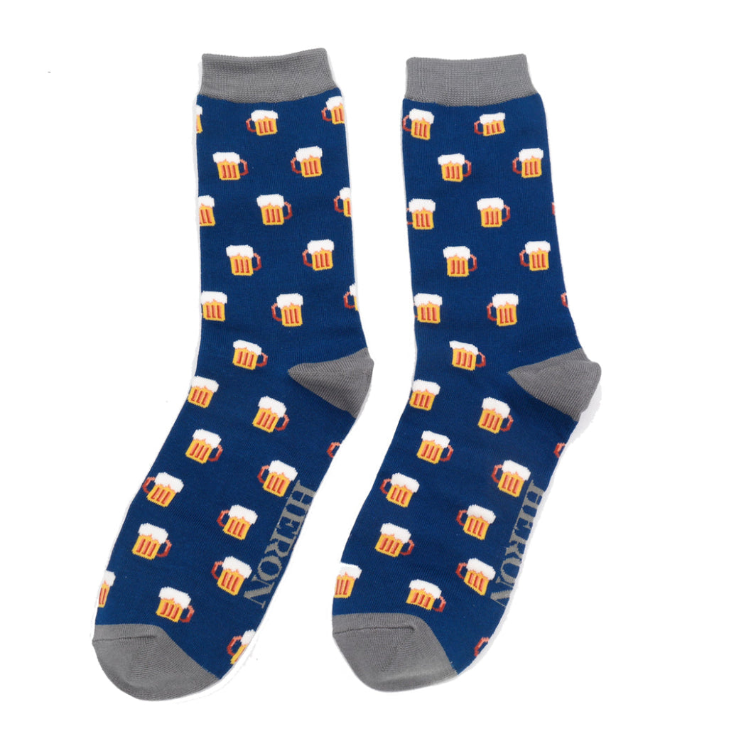 Blue socks with beer mug pattern on a white background