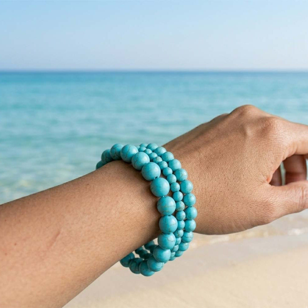 blue gemstone 3 pcs beads on woman's hand