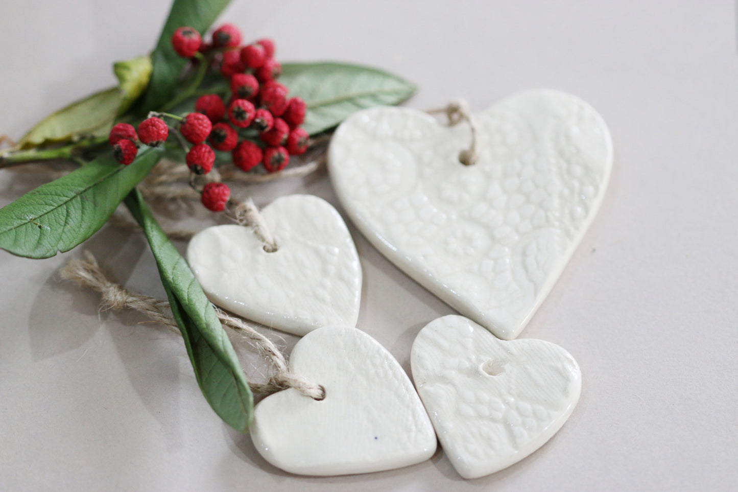 white ceramic heart shape tags. Pack of 4