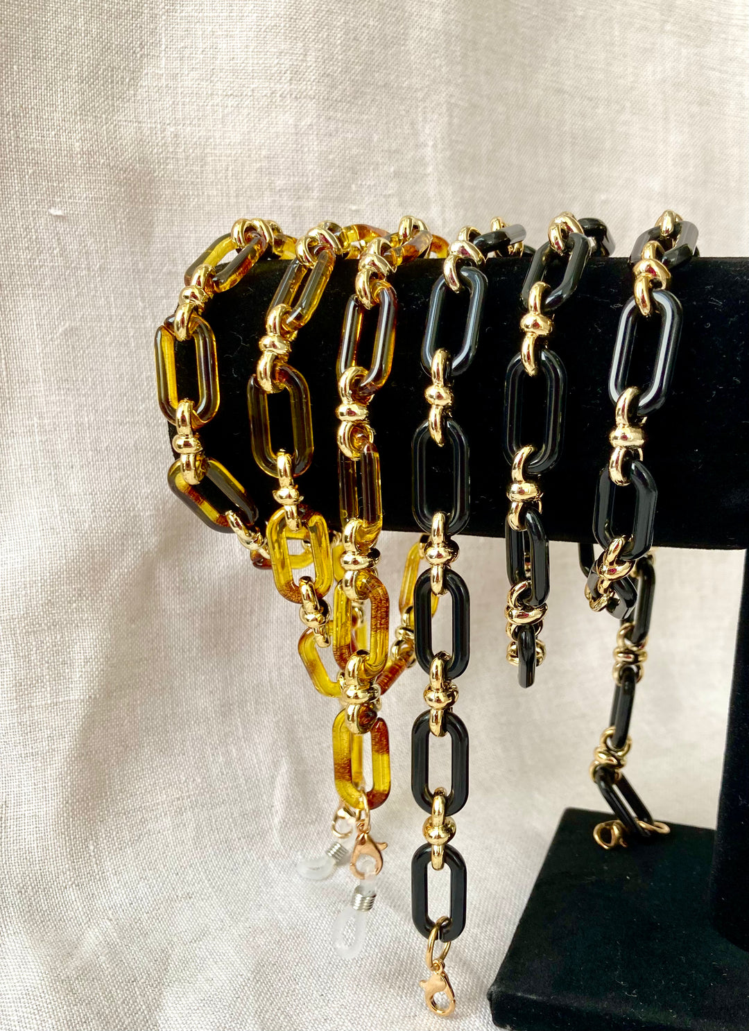 Black and amber link chain sets