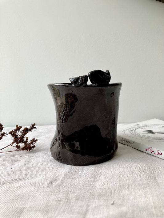 Artisan black ceramic piece