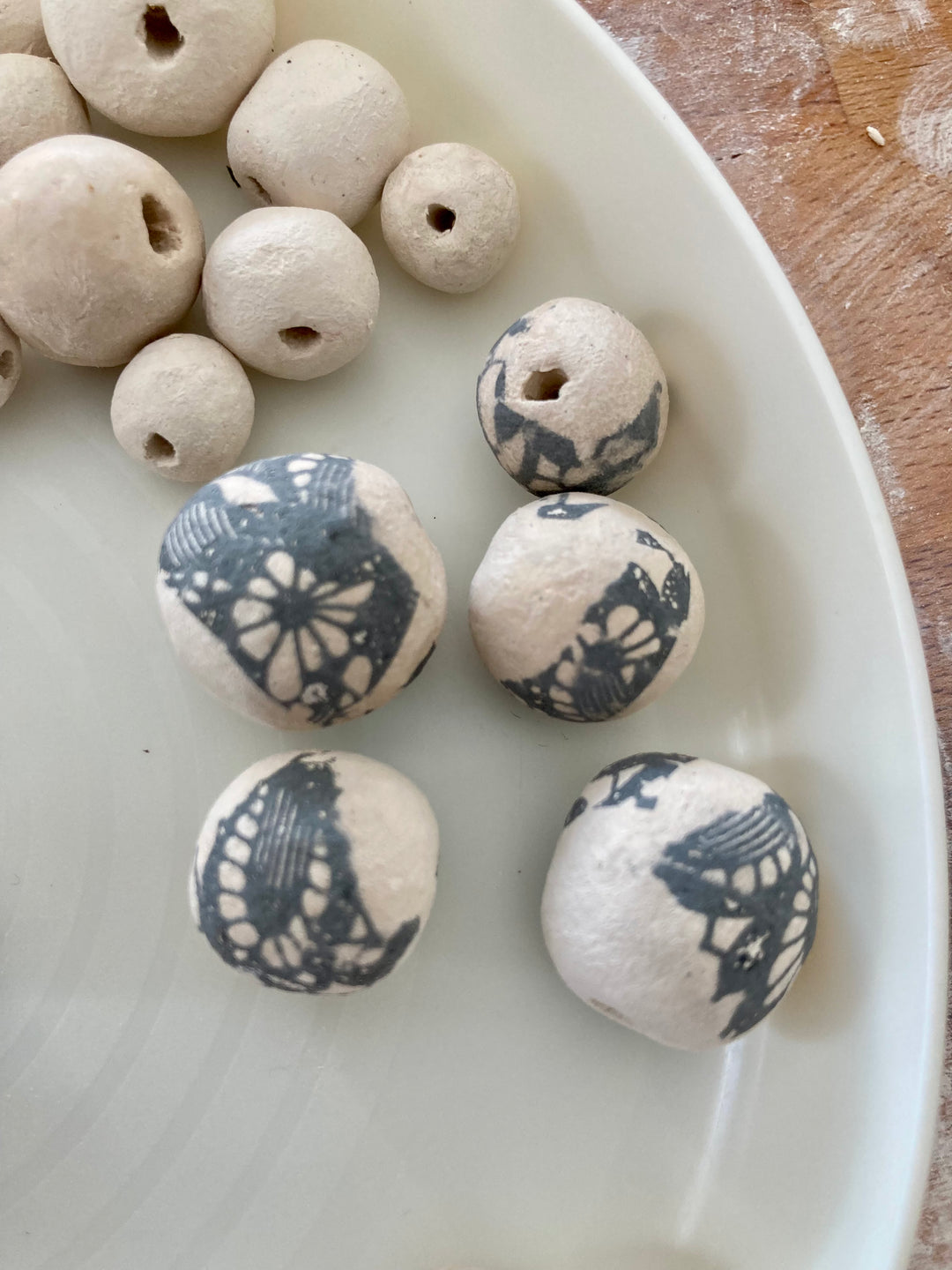 Neutral-toned beads with ceramic texture