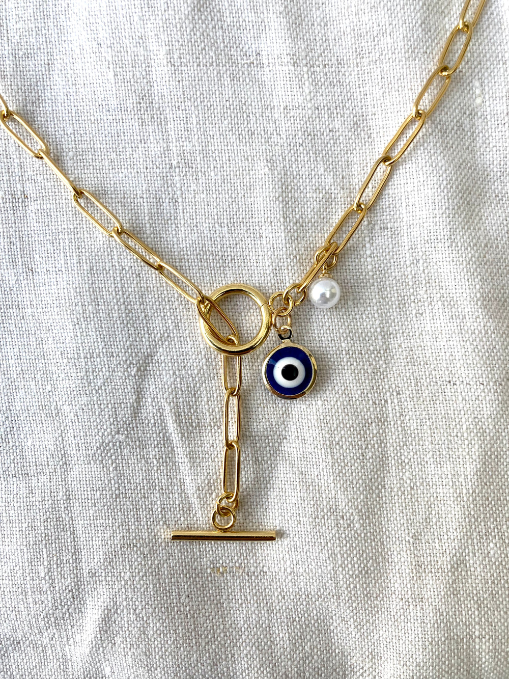 Gold chain with evil eye & pearl 1